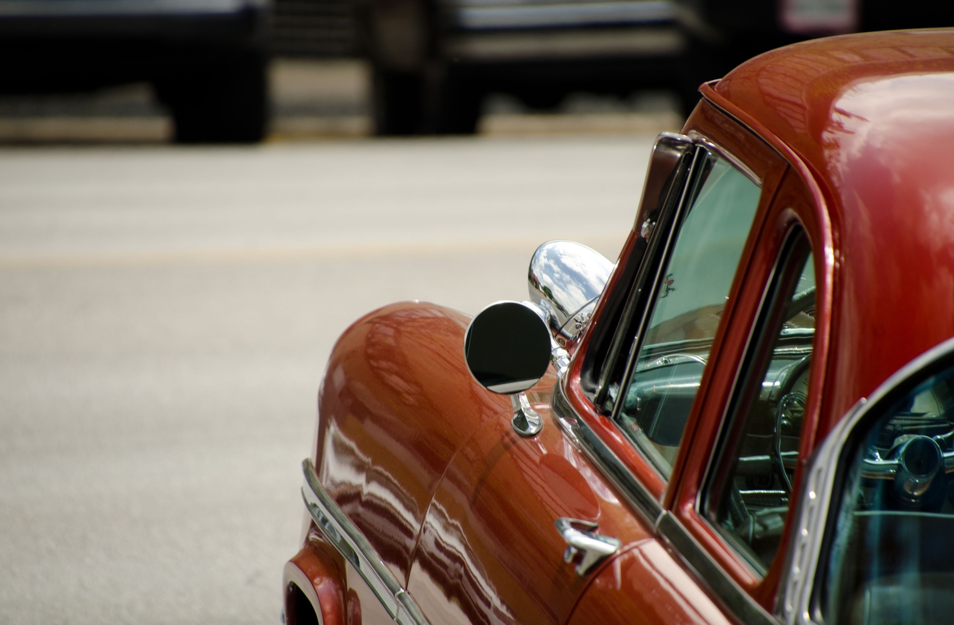 Shiny details of exterior of a classic car in SoCo, Austin