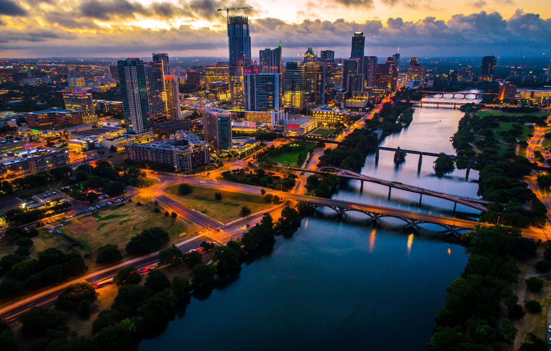 Brilliant Austin city at night nightscape aerial drone view of sunrise with city lights